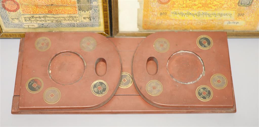 A group of Chinese and Japanese objects, 19th/20th century, including an inscribed ink box an inkstone, a lacquer bookslide, two Tibeta